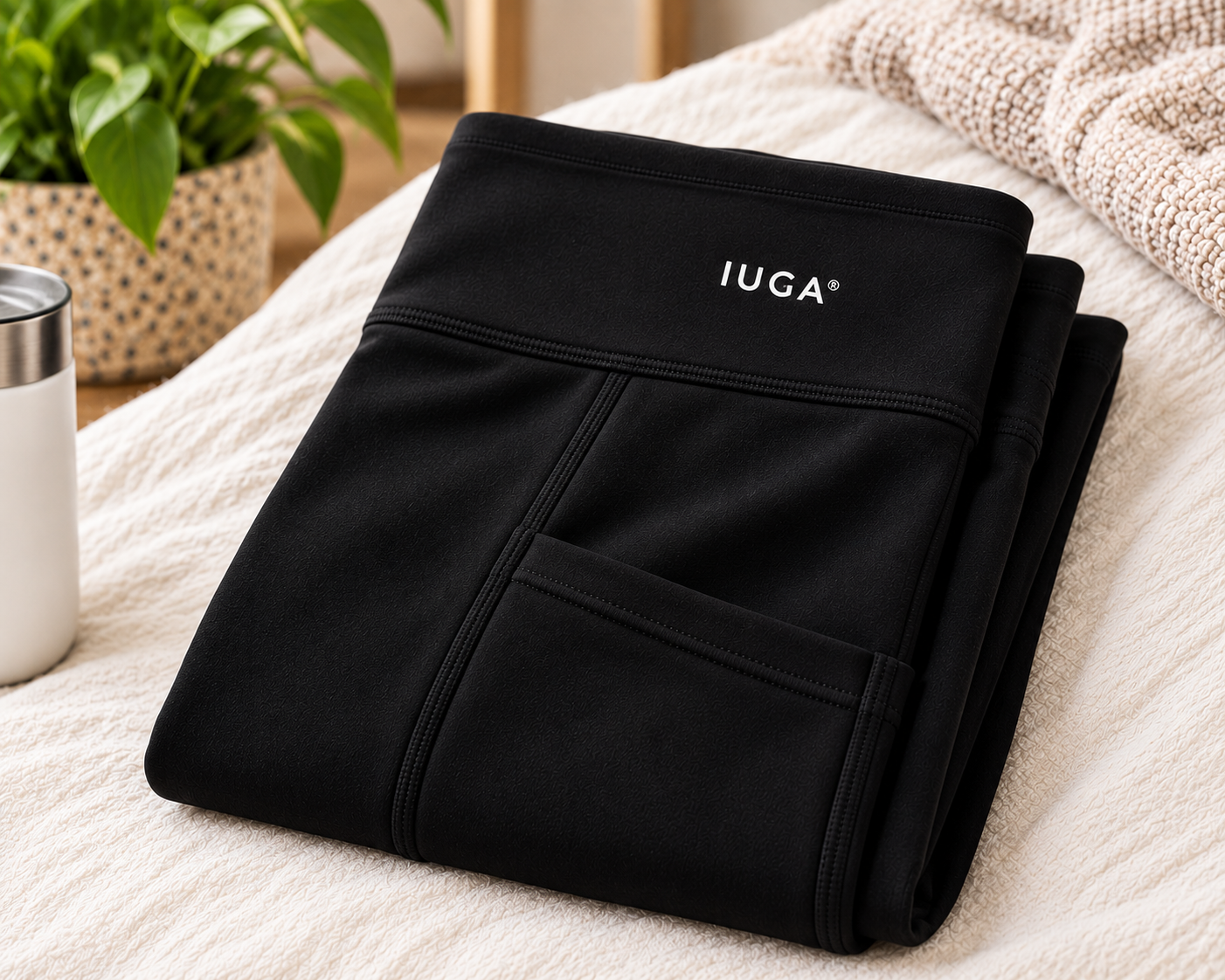 Black IUGA high-waisted workout leggings with pockets